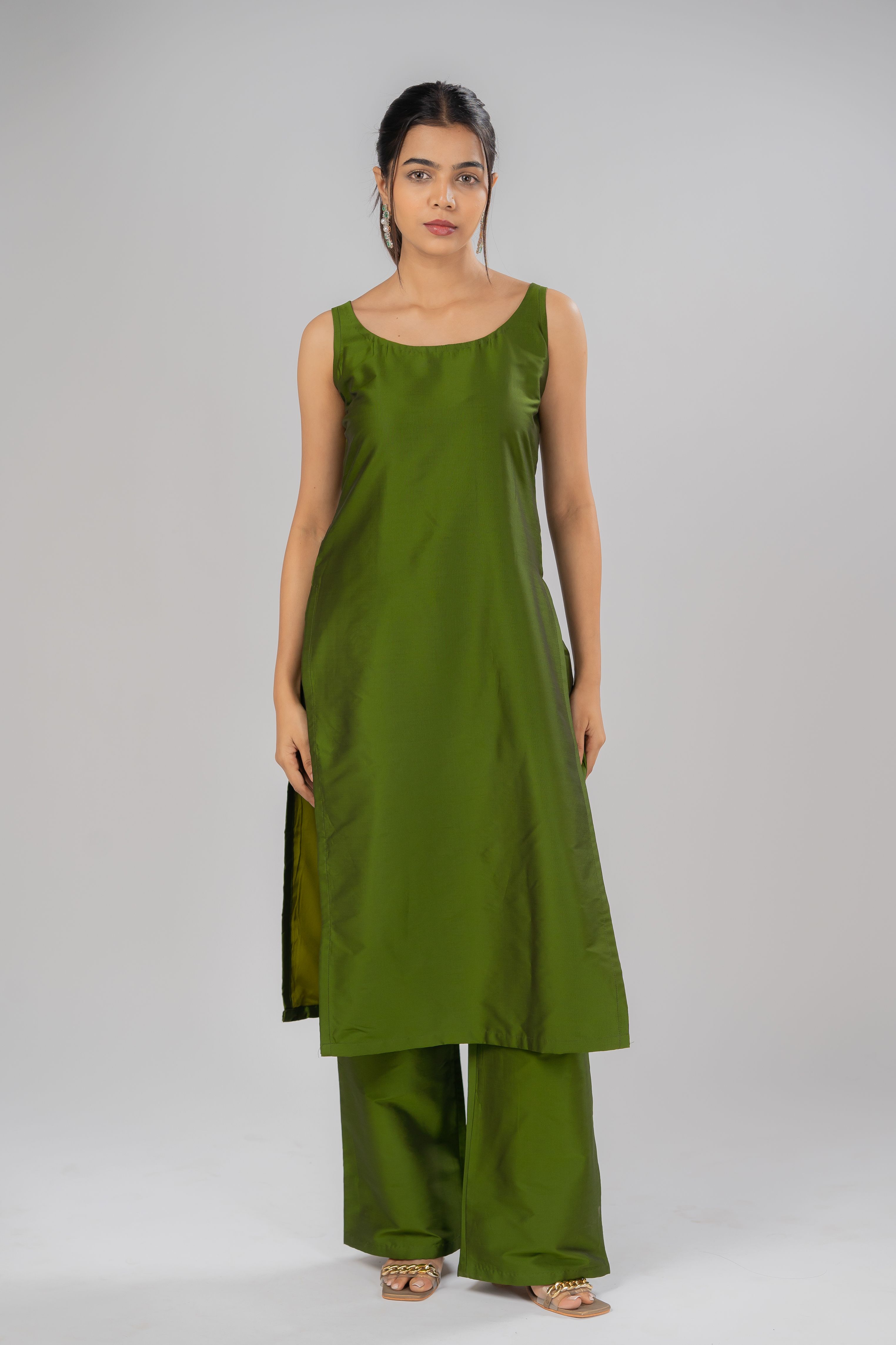 Moss green sleeveless silk kurta with moss green silk pants with pockets