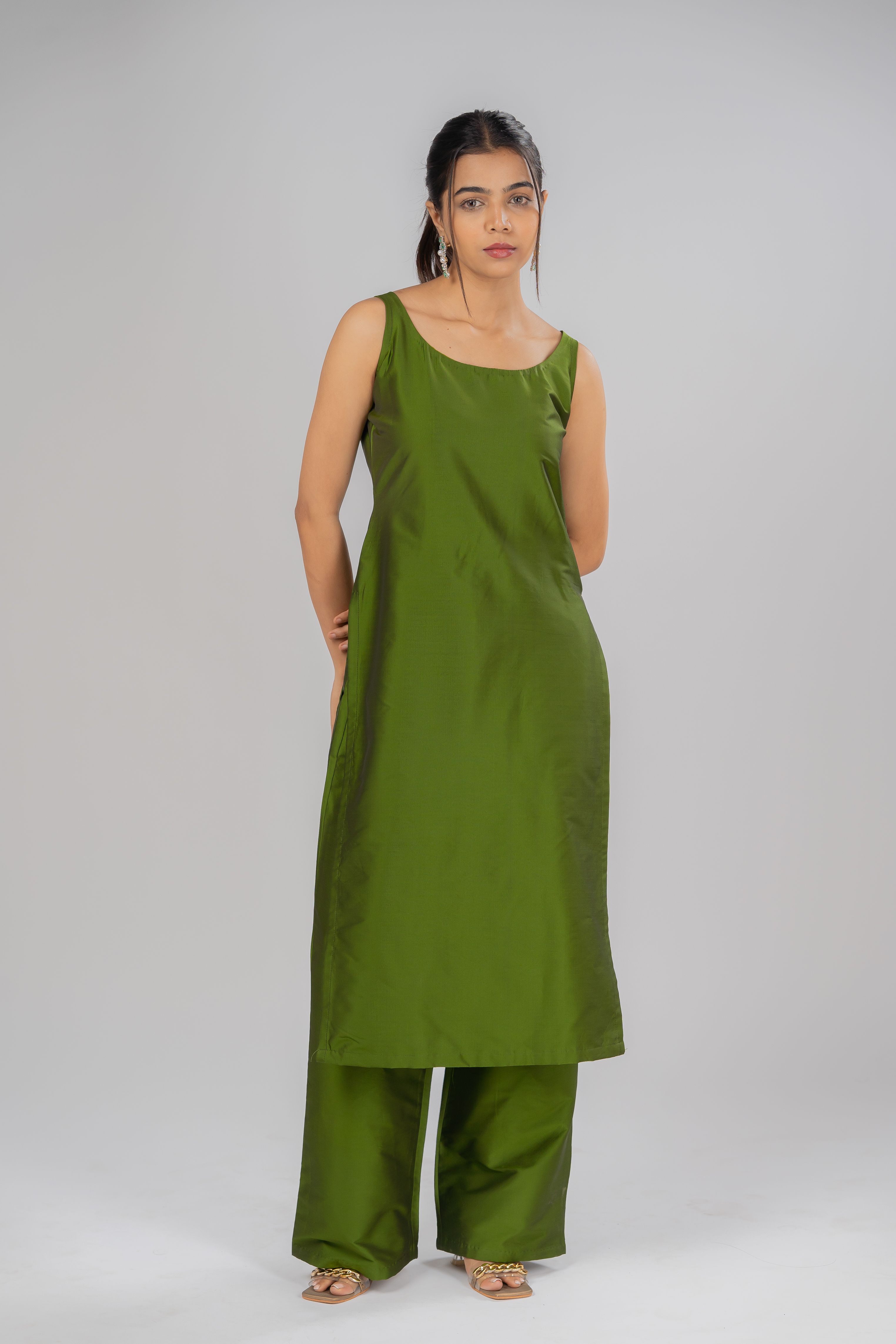 Moss green sleeveless silk kurta with moss green silk pants with pockets